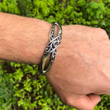 Hinged Bangle Intersecting Mobius Twists Filigree Bracelet